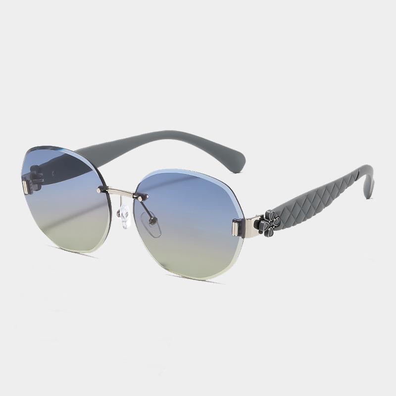 Women's Egg-Shaped Stylish Frameless Retro Sunglasses for Summer Photoshoots