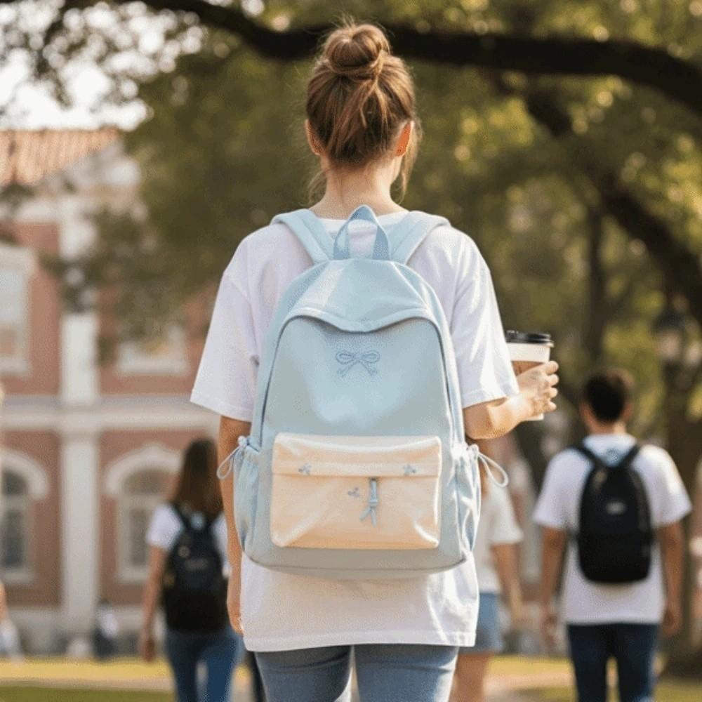 Mochila de lona con lazo Mochila casual bordada para estudiantes Bolso escolar Mochila deportiva de poliéster de color contrastante de gran capacidad