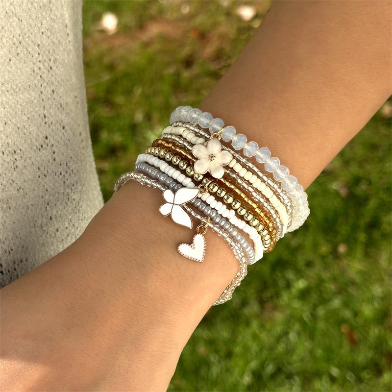Set da 9 pezzi con Ciondoli a Forma di Farfalla, Fiore, Cuore con Perline, Braccialetti con Catena e Corda Elastica, Gioielli Regalo per Donna