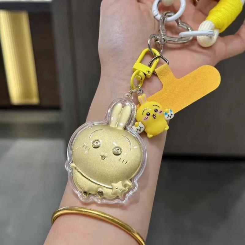 Ключница-шнурок с подвесками Куроми, Мой Мелоди, Синнаморолль и Почакко из чистого золота 999 пробы