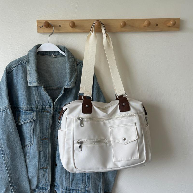 2025 new mailman large-capacity fashion simple women's lightweight shoulder bag handbag multi-functional tutoring bag bag