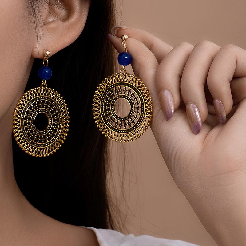 Retro Ethnic Style Round Hollow Pendant Earrings Women'S Simple Temperament Advanced Sense Earrings Atmospheric Fashion Ear Jewelry