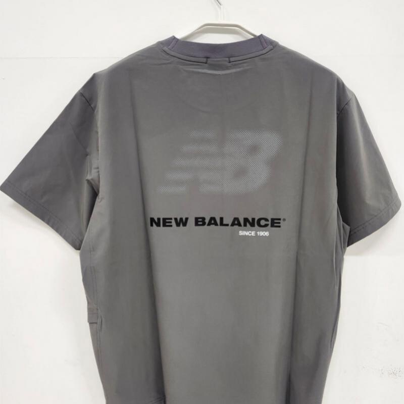 New Balance Men Frozen Essential Woven Tee Charcoal Nbneg31623