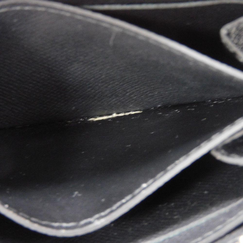 Used 12564 Zippy Coin Purse M30511 7943 New LV Logo Embossed Black Zip Around Taiga Noir Men's from Japan AUTHENTIC