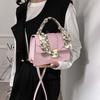 Handväska sommar ny axelväska budbärare nischad pendlar liten fyrkantig väska fräsch och söt stil