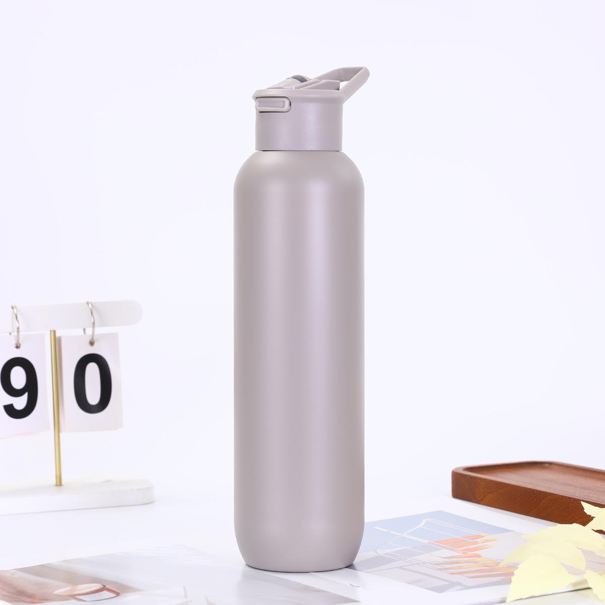 

Portable Mountaineering Double-Layer Insulated Sports Water Bottle, 304 Stainless Steel, with Handle and Small Mouth. 580ml светло-серый