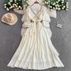 Ethnic Style Red Splicing Woven Fringed V-neck Long-sleeved Dress Women's Summer Waist and Thin Big Swing Dress
