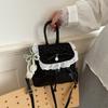 Zaino all'ingrosso stile dolce portatile piccola borsa borsa da donna 1011 estate nuova borsa a tracolla con fiocco in pizzo zaino versatile