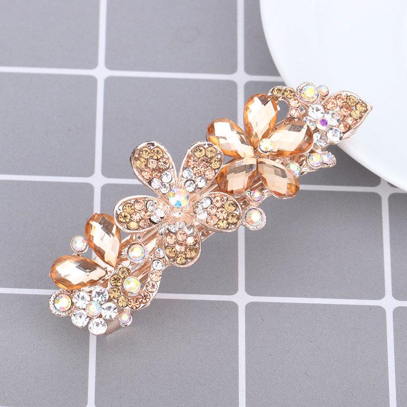 Mengpei Large Crystal Flower Hair Clip: Elegant Rhinestone Ponytail Accessory for Women.