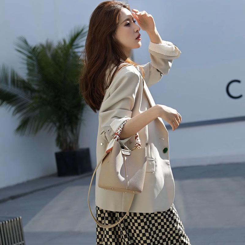 2024 Summer Women's Small Bucket Handbag: Niche Design, High-End Commuter Crossbody Bag