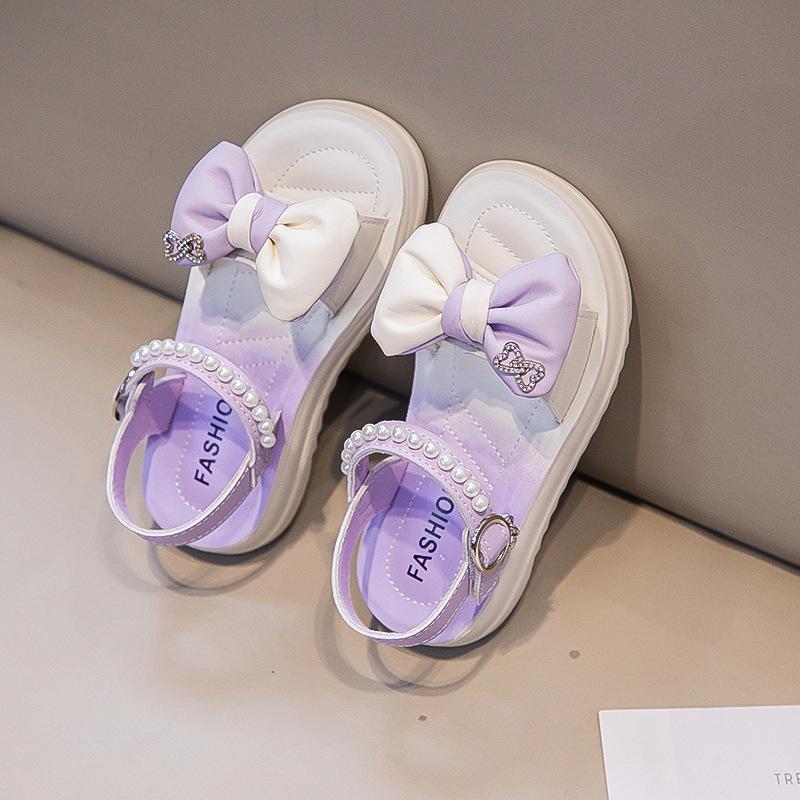 New children's beach sandals with bowknot design, soft-soled sandals for girls2026Princess style anti-slip Korean version