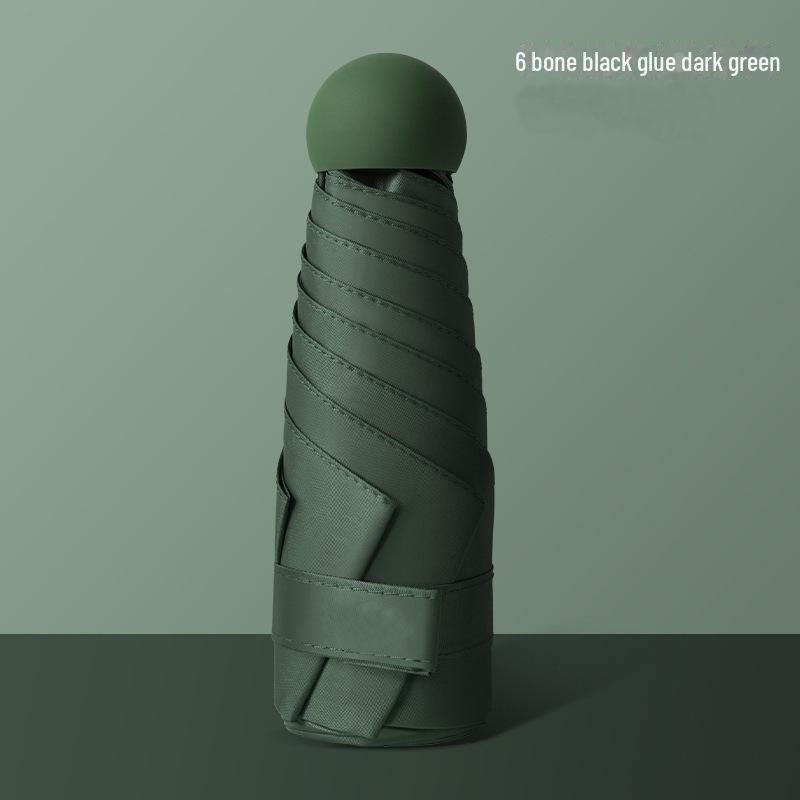 50 % rabatt på svart kapselparaply i lommeformat - Seks-skjerms sammenleggbar for sol og regn