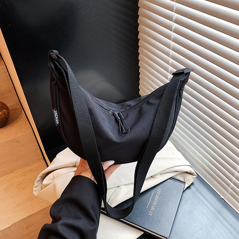 Casual simple dumpling bag nylon canvas bag female messenger bag versatile breast bag lightweight underarm bag