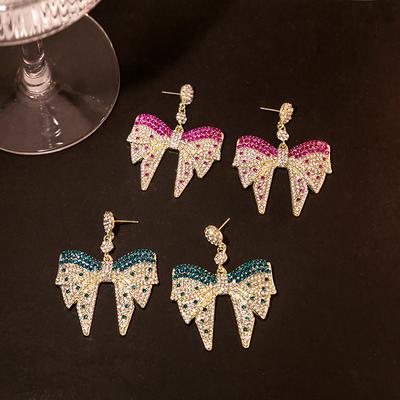 Exaggerated and Eye-catching Bow Ear Drops with Shimmering Rhinestones