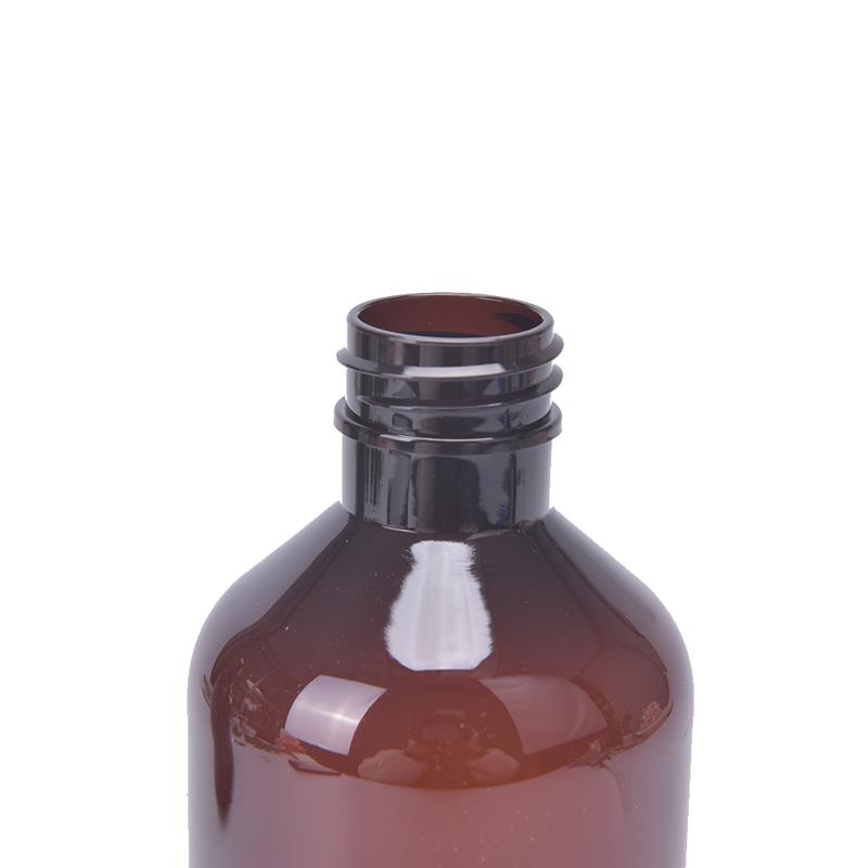 Bernsteinfarbene Plastik Leere Quetschflasche mit Schwarzem Lotionspender Probenbehälter