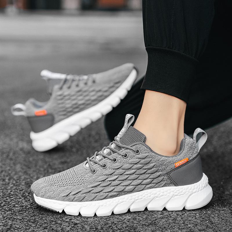 Frühling neue Mode Fly-Weave atmungsaktive Sports-Laufschuhe Studenten einfache Freizeitschuhe Herren