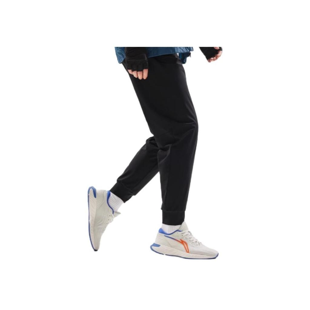 Li Ning Fitness Series Casual Comfortable Solid Color Mid Waist Moisture Wicking Knitted Sports Pants Men Pants Black AKYU415-1