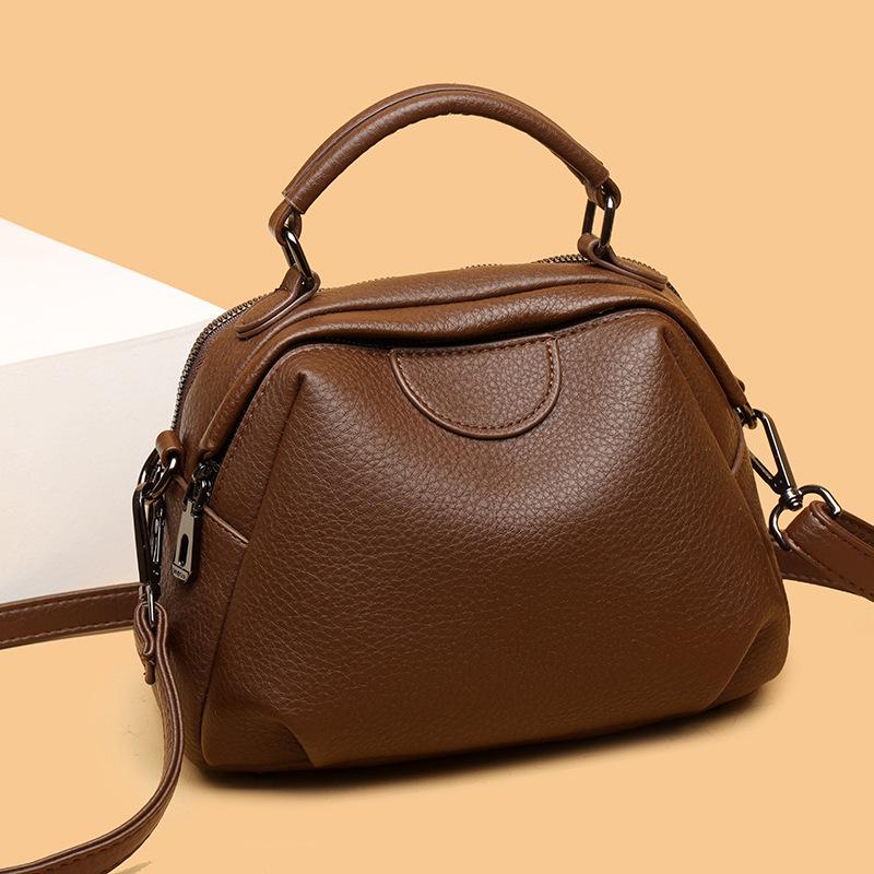 

Новая ручная косая сумка-седло большой вместимости, модная и повседневная, ретро женская сумка через плечо с коровьим принтом, простая сумка-ведро темно-коричневого