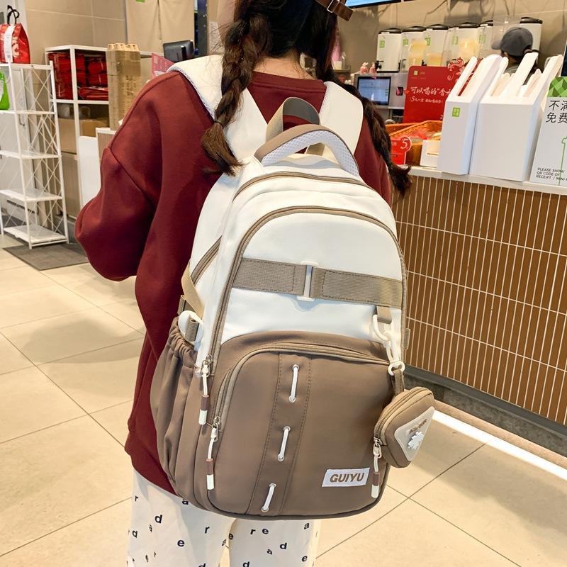 New High value Ins Style Schoolbag for Women Fashion Casual Color Blocking Backpack for Men Large Capacity Forest Style Trendy Backpack