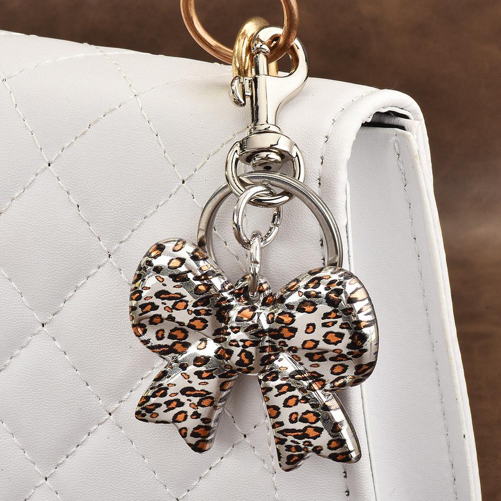 Autumn and Winter Leopard Hole Bow Love Pendant Acrylic Diy Jewelry Bag Accessories Pendant Necklace 60CM(Necklace Long)