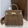 European and American Retro Suede Fringed Keli Bag 2025 New Autumn and Winter Leather Women's Bag Lock Fashion Portable Shoulder Bag