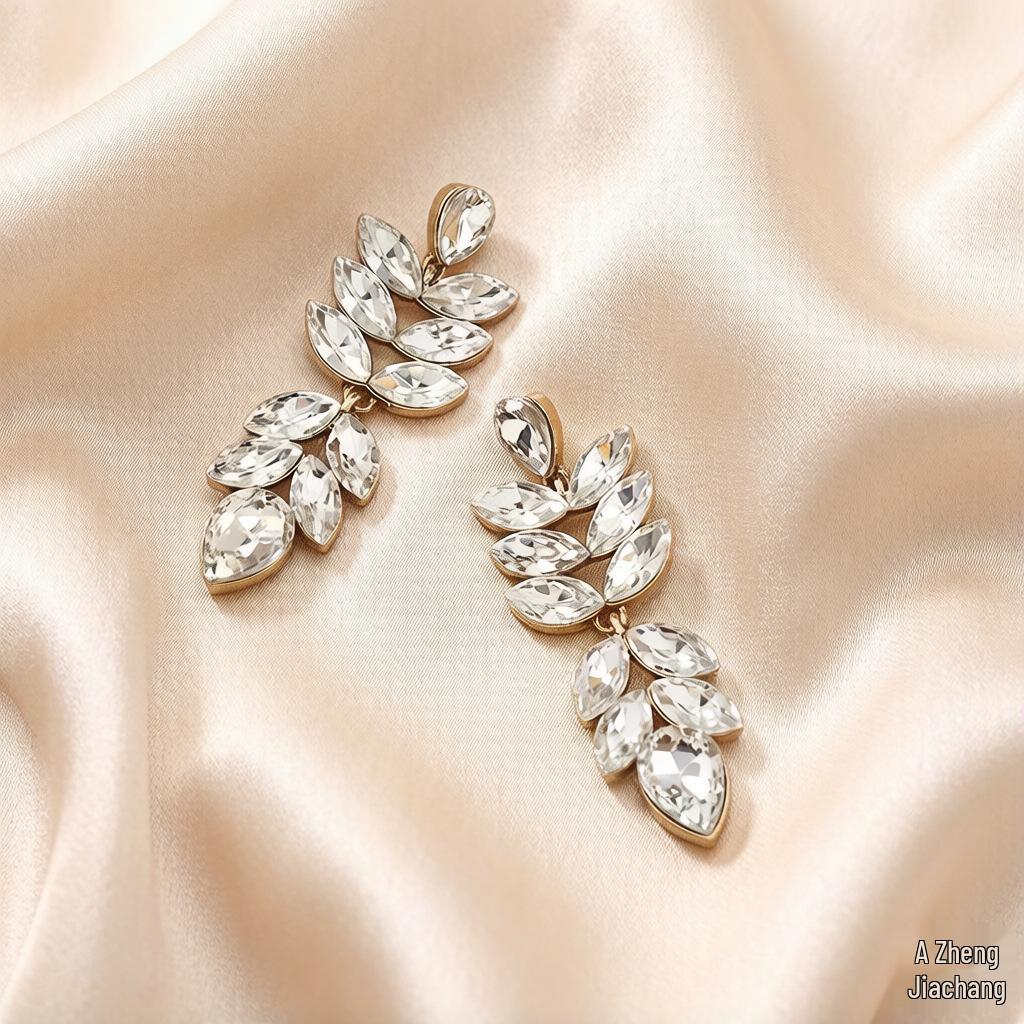 Creative Fashion Earrings - European & American Hollow Leaf Design with Diamonds for Women