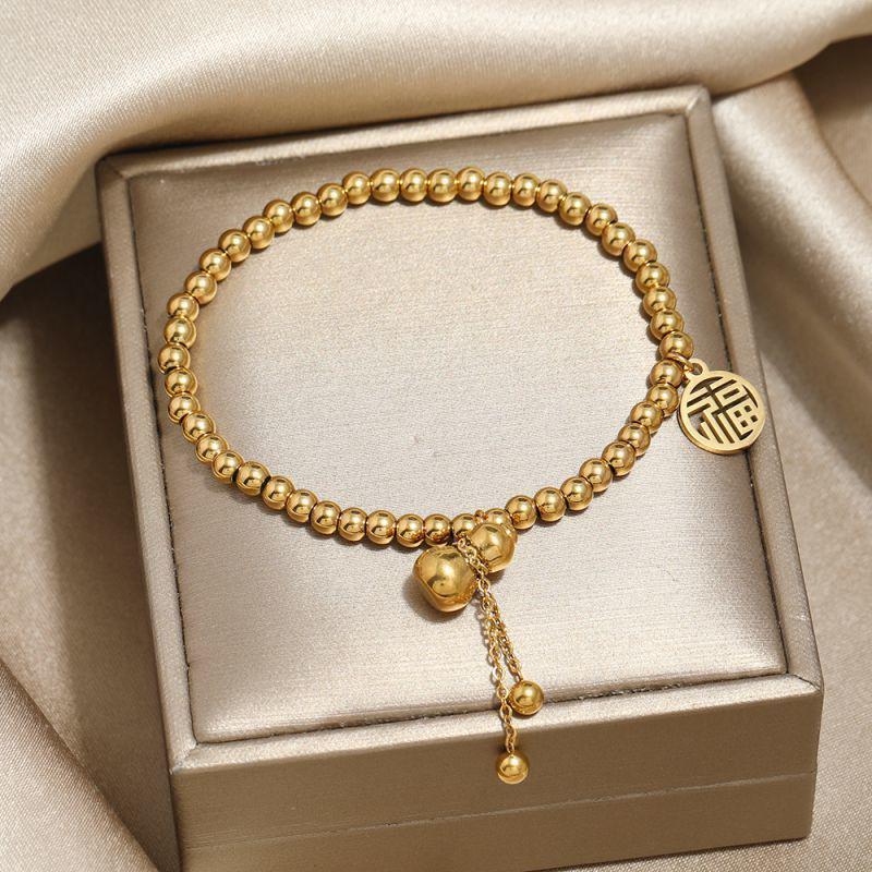 New Style Light Luxury Red Rope Titanium Steel Bracelet with Gold Coin for Women - Wealth Attraction and Festive Elegance by Xiyin
