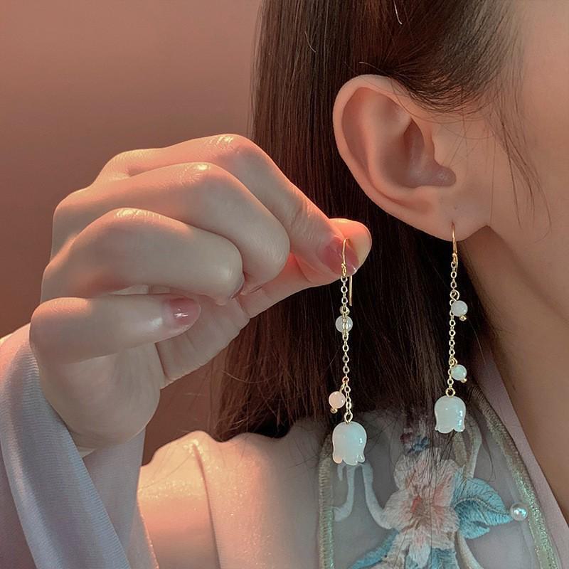 Chinese Jade Moon Tassel Earrings: Unique Design & Elegant Trend