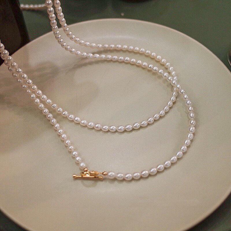 Light luxury retro natural freshwater pearl necklace women's niche high-end sense antique long millet bead sweater chain spring and autumn