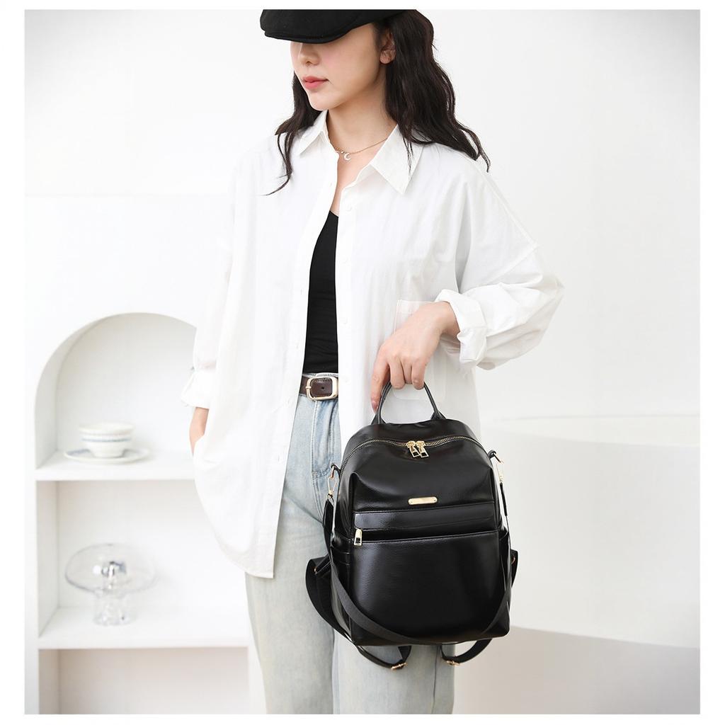 Retro soft leather backpack women's new fashion trend backpack student simple shoulder travel bag
