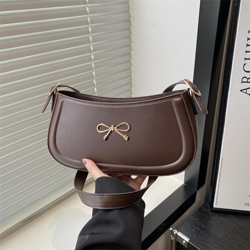 

Модная сумка-багет под мышкой с бантом, женская, для личности, трендовая, на плечо, текстурированная, для通勤, сумка-полумесяц