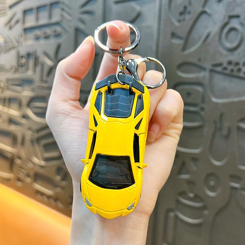 

Creative Inertia Mini Sports Car Keychain Pendant Cartoon Schoolbag Car Decoration