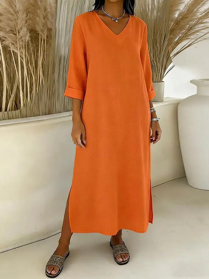 Damska sukienka bawełniano-lniana z dekoltem V, rękawem 3/4, fasonem A, na sezon Wiosna/Lato 2026 - Casualowa i luźna