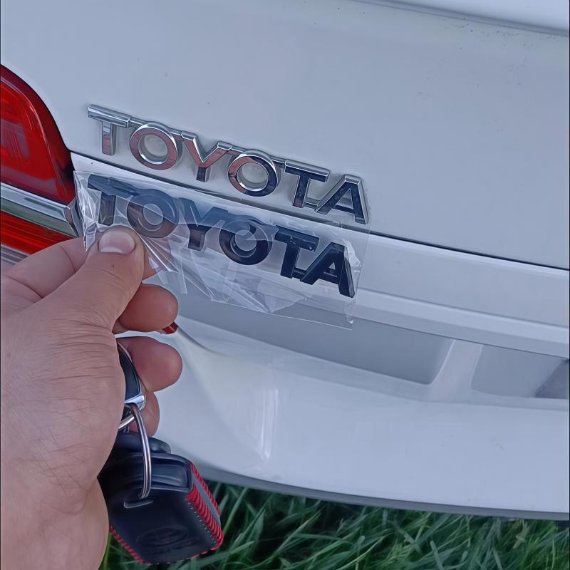 Toyota 2026 Neue Radkappen 3D schwarz Silber Auto Kofferraum Heck Aufkleber Emblem Abzeichen Dekale Dekoration Toyota Corol Autoaufkleber