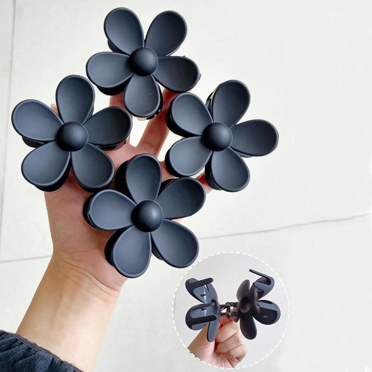 

2025 Four-Piece Flower Claw Clip Set: Hollow Acrylic Updo Shark Clips for Women