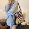 Korean casual lazy style canvas bag women's 2025 new large-capacity striped bucket bag fashionable shoulder bag