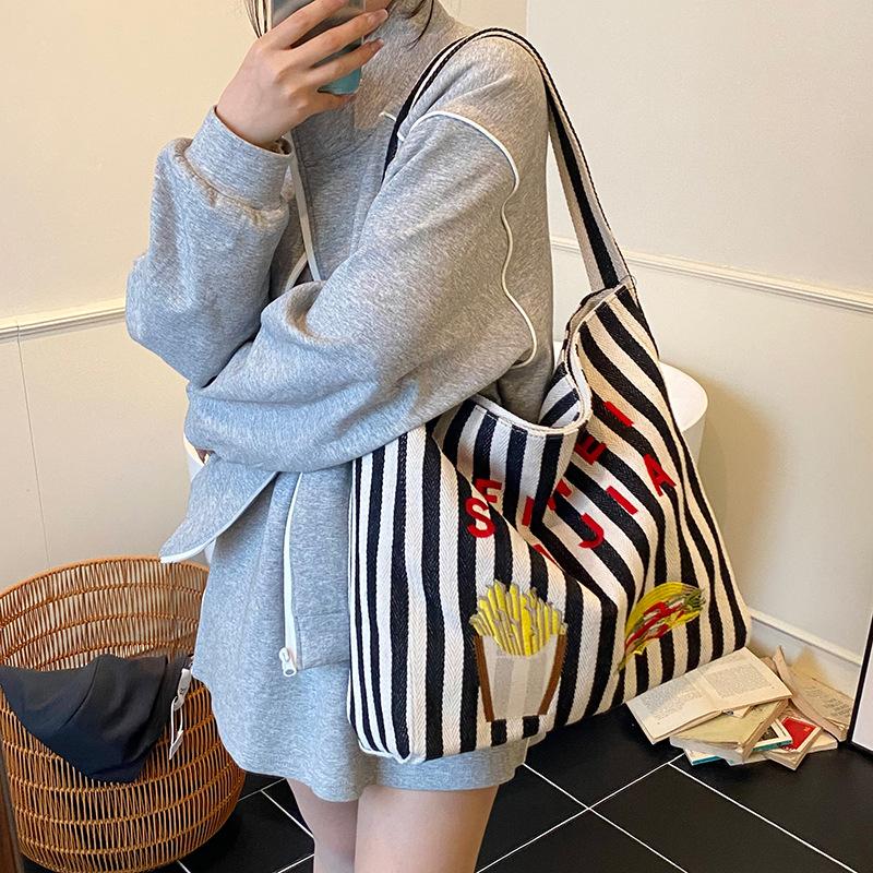 Korean casual lazy style canvas bag women's 2025 new large-capacity striped bucket bag fashionable shoulder bag