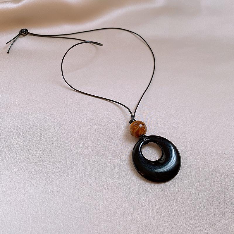 Elegant Geometric Resin Ring Necklace: Chic Long Chain for Women