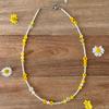 FANTASTIC PLANET yellow daisy pearl necklace