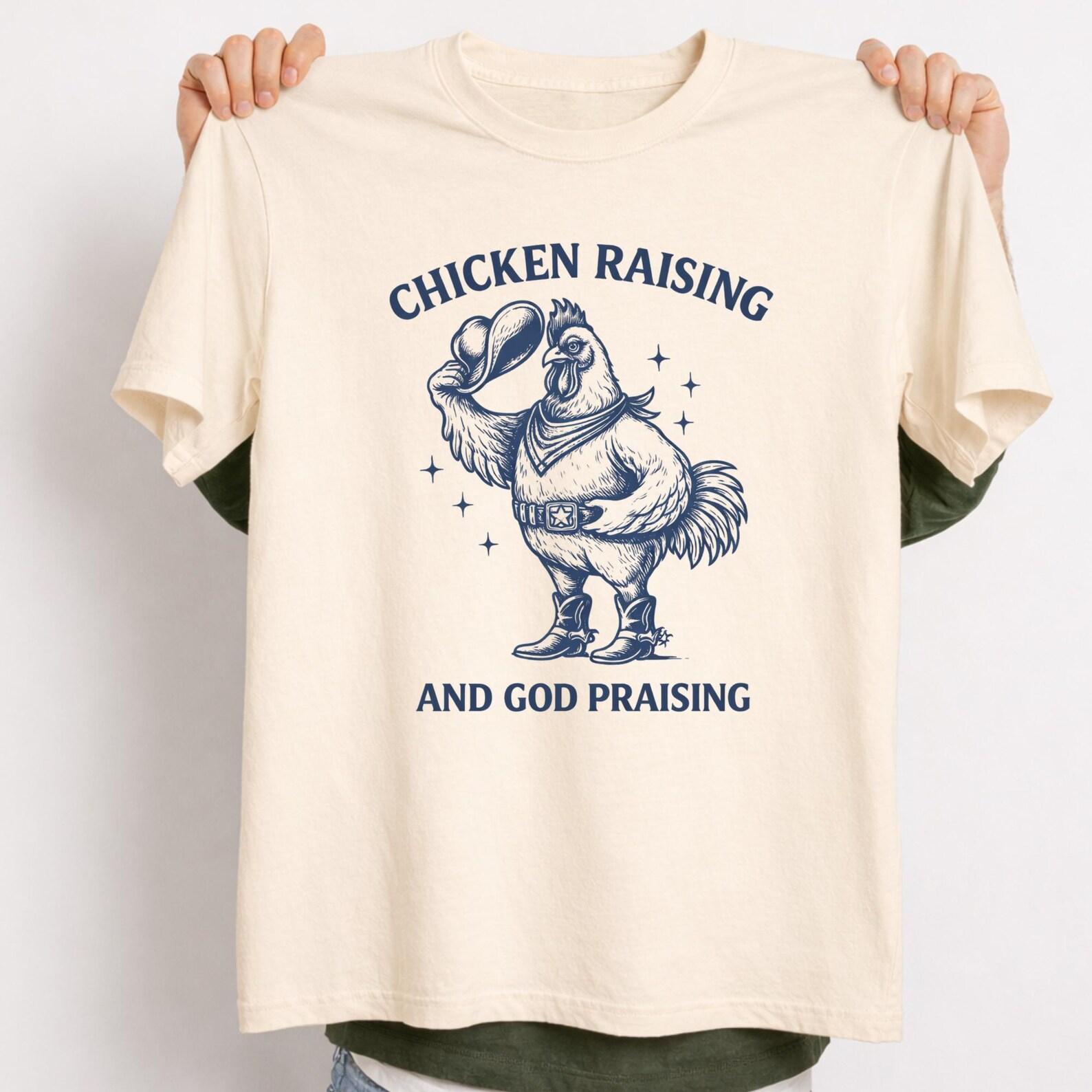 Stylish Chicken Raising and God Praising Shirt | Christian Cowboy Rooster T-Shirt | Farm Faith Western Graphic Tee. 4XL