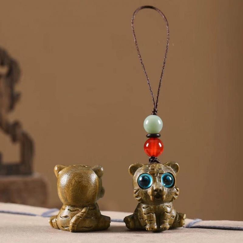 Twelve Zodiac Animal Charms Green Sandalwood Set: Rat, Ox, Tiger, Rabbit, Dragon, Snake, Horse, Sheep, Monkey, Rooster, Dog, Pig.