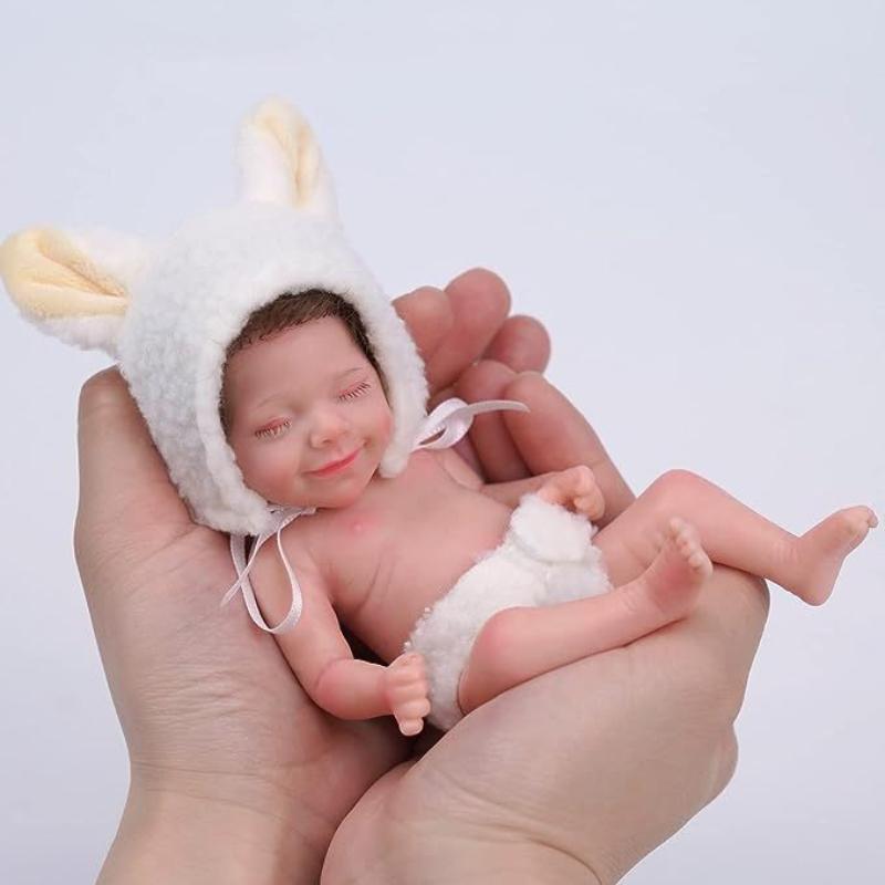 6 tums realistisk simuleringsdocka Solid mjuk silikon Återfödelsedocka April Mini Handlek Babydockor Dusch Byta kläder Docka Palm Leksak