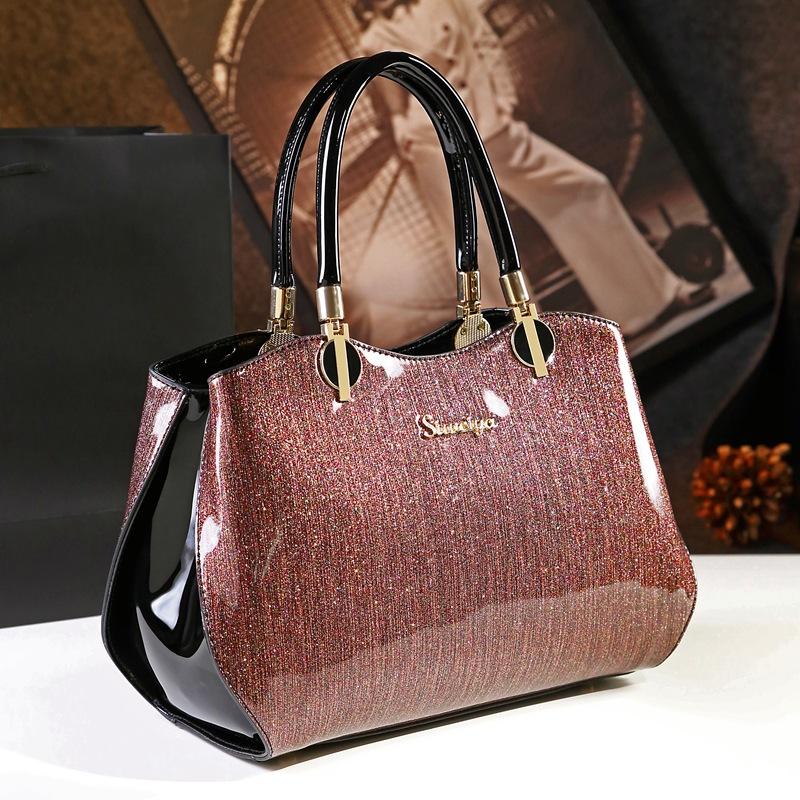 

Simple And Atmospheric Fashion Handbag, Medium Women S Bag, Mother Bag, Large Bag, Shoulder Messenger Bag. рожевий колір золота