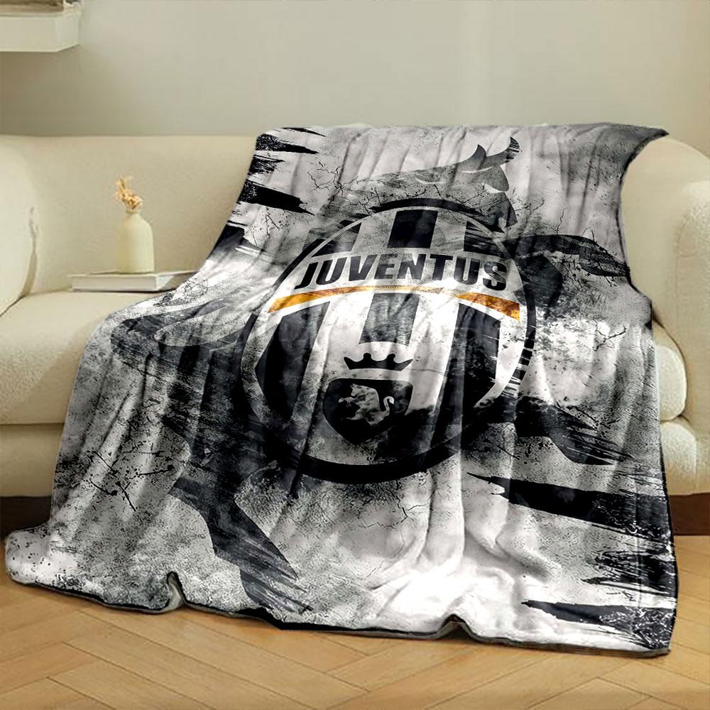 A Juventus logo with a bull silhouette on a textured, abstract background. for all seasons blanket lunch break throw gift
