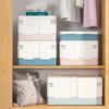 A multi colored storage box with a foldable design, perfect for storing in home wardrobes