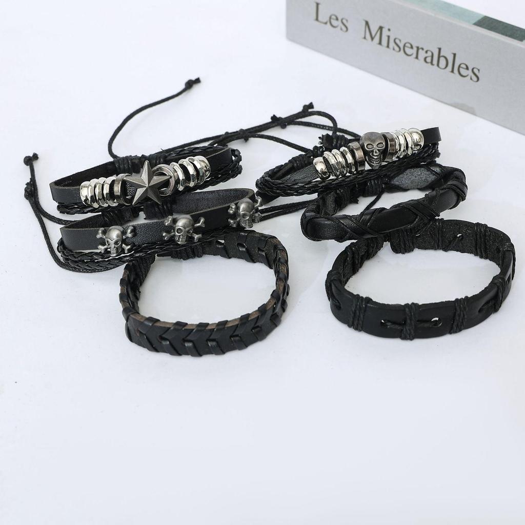 Retro Handmade Men's Woven Leather Bracelet with Bull Head & Feather Decor.