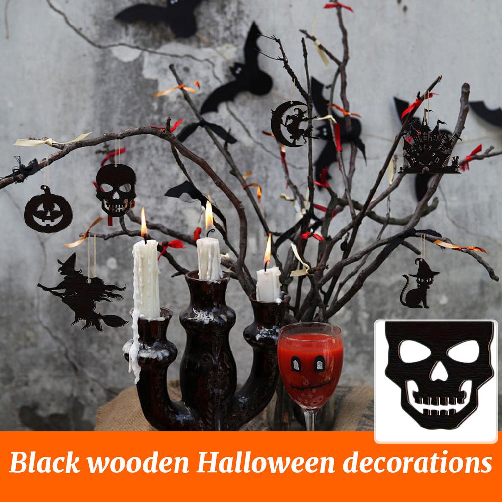Halloween Decorations With Pumpkins, Ghosts, Witch Hats, Spiders/ And Bats On Black Wooden Background