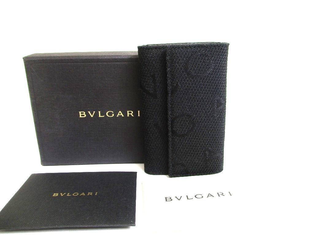 

Автентичний брелок BVLGARI Black Logo Canvas Black Leather 6 Pics #a609 Refurbished