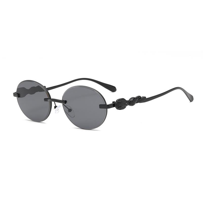 Europe and the United States gradual change frameless sunglasses oval frame fashion street shot anti-ultraviolet sunglasses retro trimmed sunshade gla