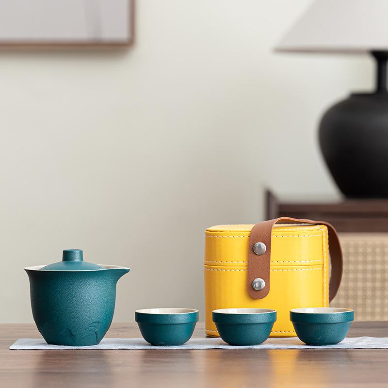 

Travel tea set Camping portable outdoor tea set Black pottery Kuaike cup One pot Two cups Storage bag Business gifts